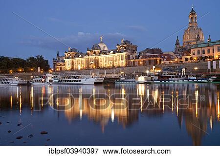 Stock Photo - "Bank of the Elbe River with Bruhl's Terrace, Dresden Academy of Fine Arts, Frauenkirche Church, Church of our Lady, and excursion boats, Dresden, Saxony, Germany, Europe". Fotosearch