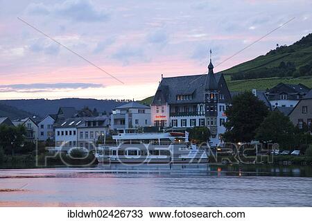 "Bank of the Moselle River with a docked ship in the evening light, Traben-Trarbach, Moselle, Rhineland-Palatinate, Germany, Europe, PublicGround, Europe" View Large Photo Image Stock Image - "Bank of the Moselle River with a docked ship in the evening light, Traben-Trarbach, Moselle, Rhineland-Palatinate, Germany, Europe, PublicGround, Europe". Fotosearch