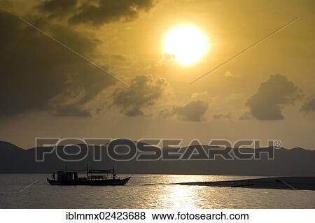 Banka, a traditional Filipino outrigger boat, anchored off the beach in the evening light, Busuanga, Philippines, Asia View Large Photo Image Stock Photo - Banka, a traditional Filipino outrigger boat, anchored off the beach in the evening light, Busuanga, Philippines, Asia. Fotosearch