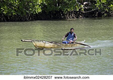 "Banka, traditional Philippine outrigger boat, on the Decalachao river, mangroves at back, Decalachao River Wharf, Coron, Philippines, Asia" View Large Photo Image Stock Photo - "Banka, traditional Philippine outrigger boat, on the Decalachao river, mangroves at back, Decalachao River Wharf, Coron, Philippines, Asia". Fotosearch