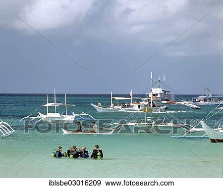 "Bankas or outrigger boats on the sea, scuba divers of a diving school at front, Boracay, Aklan, Philippines, Asia" View Large Photo Image Stock Photo - "Bankas or outrigger boats on the sea, scuba divers of a diving school at front, Boracay, Aklan, Philippines, Asia". Fotosearch