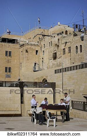 "Bar Mitzvah, Jewish coming of age ritual around a prayer table, buildings of the Jewish Quarter at the Wailing Wall or Western Wall, Muslim Quarter, Jerusalem, Israel, Middle East, Southwest Asia, Asia" View Large Photo Image Picture - "Bar Mitzvah, Jewish coming of age ritual around a prayer table, buildings of the Jewish Quarter at the Wailing Wall or Western Wall, Muslim Quarter, Jerusalem, Israel, Middle East, Southwest Asia, Asia". Fotosearch