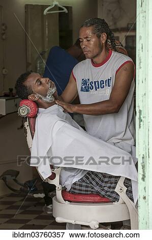 "Barber at work, Mindelo, Sao Vicente, Cape Verde, Africa" View Large Photo Image Stock Photo - "Barber at work, Mindelo, Sao Vicente, Cape Verde, Africa". Fotosearch