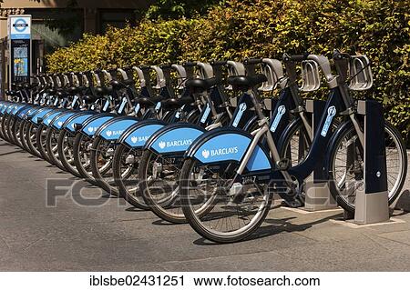 Stock Image - "Barclays bikes for rent at Tower Bridge, London, England, United Kingdom, Europe". Fotosearch