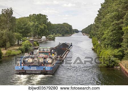 "Barge transporting coal, Oder Havel Canal, near Marienwerder - Barnim, Brandenburg, Germany, Europe" View Large Photo Image Stock Image - "Barge transporting coal, Oder Havel Canal, near Marienwerder - Barnim, Brandenburg, Germany, Europe". Fotosearch