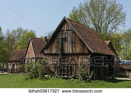 "Barn on pillars with stone slabs to protect the grain from mice, Muhlenhof-Freilichtmuseum Munster open-air museum, Munster, North Rhine-Westphalia, Germany, Europe" View Large Photo Image Stock Photo - "Barn on pillars with stone slabs to protect the grain from mice, Muhlenhof-Freilichtmuseum Munster open-air museum, Munster, North Rhine-Westphalia, Germany, Europe". Fotosearch