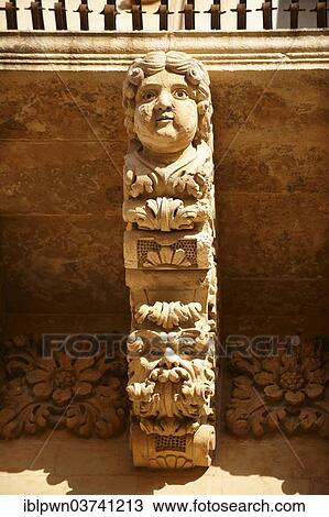 Stock Image - "Baroque balcony support sculpture, Noto, Ragusa Province, Sicily, Italy, Europe". Fotosearch