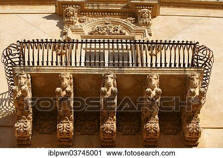 Stock Image - "Baroque balcony support sculptures, Noto, Ragusa Province, Sicily, Italy, Europe". Fotosearch