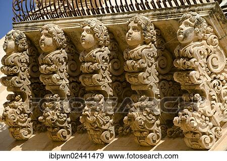 Stock Photo - "Baroque sculptures, props on a balcony, Palazzo Nicolaci di Villadorata, Noto, UNESCO World Heritage Site, Sicily, Italy, Europe". Fotosearch