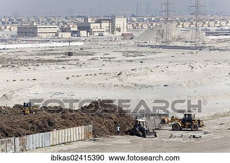 Barren land with electricity transmission pylons, urban development area, Nakheel Harbour, Dubai, United Arab Emirates, Middle East, Asia View Large Photo Image Stock Image - Barren land with electricity transmission pylons, urban development area, Nakheel Harbour, Dubai, United Arab Emirates, Middle East, Asia. Fotosearch