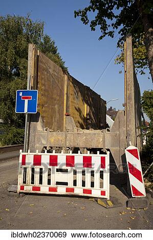 "Barricade for road construction, renewal of the sewerage system, Koenigstrasse, Kamen, Ruhr Area, North Rhine-Westphalia, Germany, Europe, PublicGround, Europe" View Large Photo Image Stock Photo - "Barricade for road construction, renewal of the sewerage system, Koenigstrasse, Kamen, Ruhr Area, North Rhine-Westphalia, Germany, Europe, PublicGround, Europe". Fotosearch