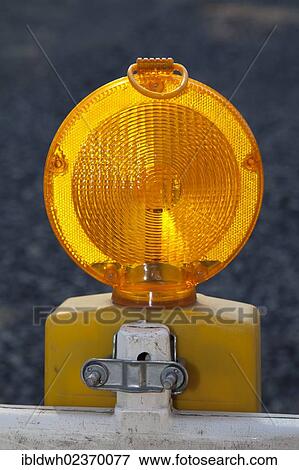 Barricade warning lamp on a construction site View Large Photo Image Stock Photo - Barricade warning lamp on a construction site. Fotosearch
