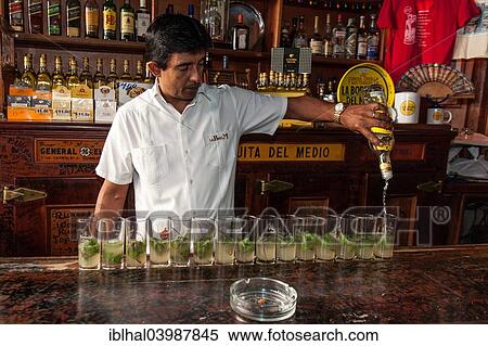 "Bartender, preparing Mojitos in the bar """"La Bodeguita del Medio"""", Old Havana, Havana, Cuba, North America" View Large Photo Image Stock Photography - "Bartender, preparing Mojitos in the bar """"La Bodeguita del Medio"""", Old Havana, Havana, Cuba, North America". Fotosearch