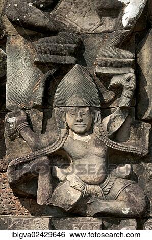 "Bas-relief depicting a woman with a triangular Bayon-style headdress, decoration on the Terrace of the Leper King, north of the Elephant Terrace, Angkor Thom, Angkor, Cambodia, Southeast Asia, Asia" View Large Photo Image Stock Photograph - "Bas-relief depicting a woman with a triangular Bayon-style headdress, decoration on the Terrace of the Leper King, north of the Elephant Terrace, Angkor Thom, Angkor, Cambodia, Southeast Asia, Asia". Fotosearch