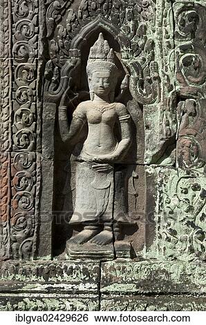 "Bas-relief of a female deity, Devata, as temple guard, Preah Khan Temple, built by King Jayavarman VII in the 12th century, Angkor, Siem Reap, Cambodia, Southeast Asia, Asia" View Large Photo Image Stock Photograph - "Bas-relief of a female deity, Devata, as temple guard, Preah Khan Temple, built by King Jayavarman VII in the 12th century, Angkor, Siem Reap, Cambodia, Southeast Asia, Asia". Fotosearch