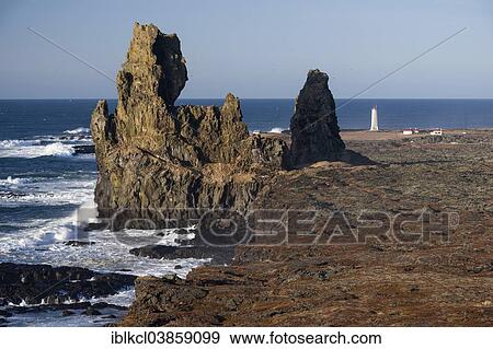 "Basalt rocks of Londrangar, Malarrif Lighthouse, Snaefellsnes, Iceland, Europe" View Large Photo Image Stock Photo - "Basalt rocks of Londrangar, Malarrif Lighthouse, Snaefellsnes, Iceland, Europe". Fotosearch