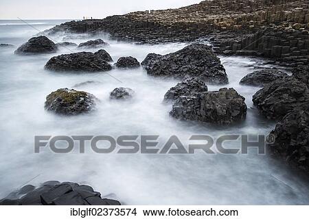 "Basaltic rocks on the shore with waves, Giant's Causeway, Coleraine, Northern Ireland, United Kingdom, Europe" View Large Photo Image Picture - "Basaltic rocks on the shore with waves, Giant's Causeway, Coleraine, Northern Ireland, United Kingdom, Europe". Fotosearch