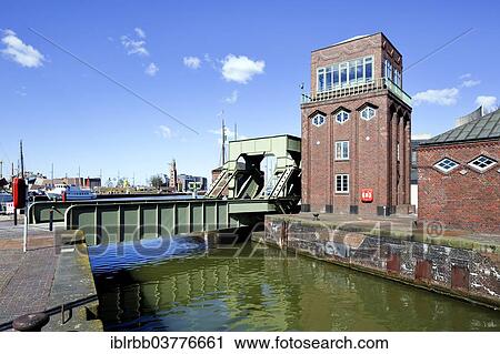 "Bascule bridge between the Alter Hafen and Neuer Hafen ports, Havenwelten district, Bremerhaven, Bremen, Germany, Europe" View Large Photo Image Stock Image - "Bascule bridge between the Alter Hafen and Neuer Hafen ports, Havenwelten district, Bremerhaven, Bremen, Germany, Europe". Fotosearch