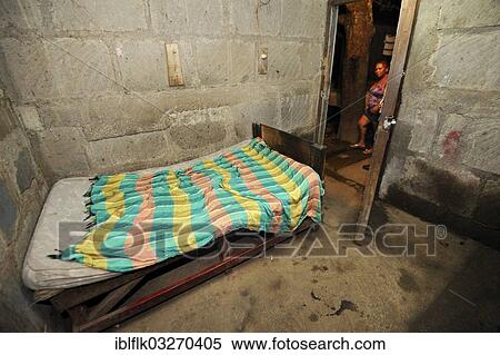 "Basic room with a bed in a cheap brothel on the outskirts of the city, Masaya, Departamento Masaya, Nicaragua, North America" View Large Photo Image Stock Photography - "Basic room with a bed in a cheap brothel on the outskirts of the city, Masaya, Departamento Masaya, Nicaragua, North America". Fotosearch
