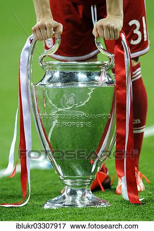 "Bastian Schweinsteiger leaning on the trophy, UEFA Champions League Final 2013, Borussia Dortmund - FC Bayern Munich, Wembley-Stadium, London, London region, England, United Kingdom, Europe" View Large Photo Image Stock Photo - "Bastian Schweinsteiger leaning on the trophy, UEFA Champions League Final 2013, Borussia Dortmund - FC Bayern Munich, Wembley-Stadium, London, London region, England, United Kingdom, Europe". Fotosearch