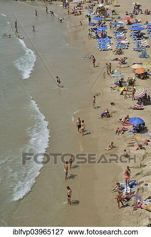 "Bathers on Playa Poniente, Benidorm, Costa Blanca, Spain beach" View Large Photo Image Stock Photo - "Bathers on Playa Poniente, Benidorm, Costa Blanca, Spain beach". Fotosearch