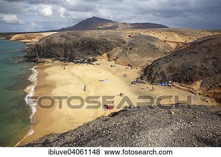 "Bathers on the beach of Papagayo, Playa de Papagayo, Park Monumento Natural de Los Ajaches nature park, Lanzarote, Canary Islands, Spain, Europe" View Large Photo Image Stock Photo - "Bathers on the beach of Papagayo, Playa de Papagayo, Park Monumento Natural de Los Ajaches nature park, Lanzarote, Canary Islands, Spain, Europe". Fotosearch