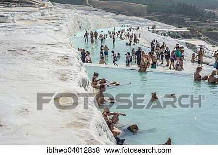 Stock Photo - "Bathers on the travertine terraces of Pamukkale, UNESCO World Heritage Site, Denizli Province, Turkey, Asia". Fotosearch