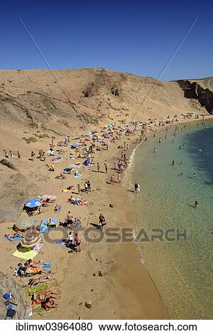 "Bathing on the beach, Playas de Papagayo or Papagayo beaches, Monumento Natural de los Ajaches nature park, Lanzarote, Canary Islands, Spain, Europe" View Large Photo Image Stock Image - "Bathing on the beach, Playas de Papagayo or Papagayo beaches, Monumento Natural de los Ajaches nature park, Lanzarote, Canary Islands, Spain, Europe". Fotosearch