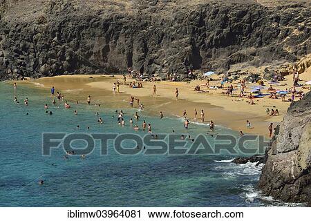 "Bathing on the beach, Playas de Papagayo or Papagayo beaches, Monumento Natural de los Ajaches nature park, Lanzarote, Canary Islands, Spain, Europe" View Large Photo Image Stock Image - "Bathing on the beach, Playas de Papagayo or Papagayo beaches, Monumento Natural de los Ajaches nature park, Lanzarote, Canary Islands, Spain, Europe". Fotosearch