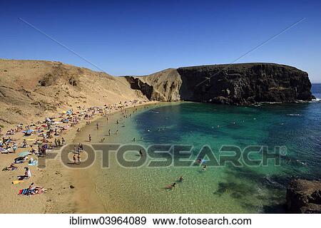 "Bathing on the beach, Playas de Papagayo or Papagayo beaches, Monumento Natural de los Ajaches nature park, Lanzarote, Canary Islands, Spain, Europe" View Large Photo Image Stock Photo - "Bathing on the beach, Playas de Papagayo or Papagayo beaches, Monumento Natural de los Ajaches nature park, Lanzarote, Canary Islands, Spain, Europe". Fotosearch
