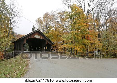 Stock Image - Battleground Covered Bridge in autumn, Mill Brook, Vermont, USA. Fotosearch