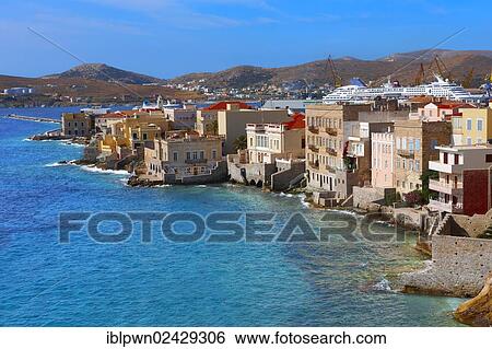 Stock Photograph - "Bay and buildings of Ermoupolis harbour, Syros, Cyclades Islands, Greece, Europe". Fotosearch