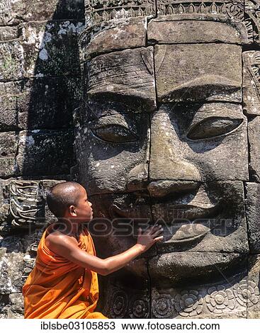 "Bayon temple, monk, face tower, face of Bodhisattva Lokeshvara, Avalokiteshvara, Angkor Thom, Siem Reap Province, Cambodia, Asia" View Large Photo Image Stock Image - "Bayon temple, monk, face tower, face of Bodhisattva Lokeshvara, Avalokiteshvara, Angkor Thom, Siem Reap Province, Cambodia, Asia". Fotosearch