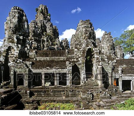Picture - "Bayon temple, monk, gallery on the southern facade, face towers, Angkor Thom, Siem Reap Province, Cambodia, Asia". Fotosearch