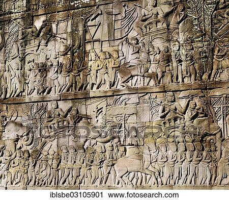 Stock Image - "Bayon temple, relief depicting an expedition of the Khmer against the Cham, wall relief, eastern facade, Angkor Thom, Siem Reap Province, Cambodia, Asia". Fotosearch