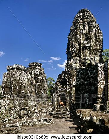 Stock Photography - "Bayon temple, sitting in window alcove, face towers, smiling faces of Bodhisattva Lokeshvara, Avalokiteshvara, Angkor Thom, Siem Reap Province, Cambodia, Asia". Fotosearch