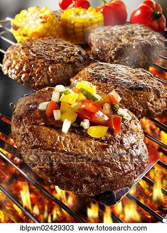 BBQ beef burgers being cooked on a BBQ grill View Large Photo Image Stock Image - BBQ beef burgers being cooked on a BBQ grill. Fotosearch