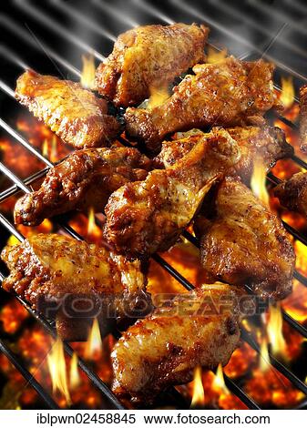 BBQ chicken wings on a BBQ grill View Large Photo Image Stock Photography - BBQ chicken wings on a BBQ grill. Fotosearch