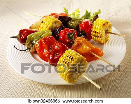 Stock Photography - "BBQ vegetarian kebabs of sweet corn, peppers and red onions". Fotosearch