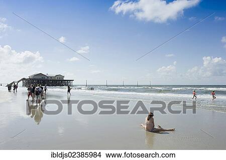 Picture - "Beach and building on stilts, St Peter-Ording, North Frisia, Schleswig-Holstein, Germany, Europe". Fotosearch