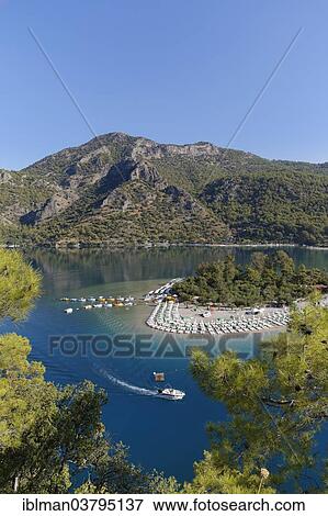 "Beach and lagoon of Oludeniz, Fethiye, Mugla Province, Lycia, Aegean, Turkey, Asia" View Large Photo Image Stock Photo - "Beach and lagoon of Oludeniz, Fethiye, Mugla Province, Lycia, Aegean, Turkey, Asia". Fotosearch