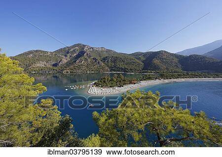 "Beach and lagoon of Oludeniz, Fethiye, Mugla Province, Lycia, Aegean, Turkey, Asia" View Large Photo Image Stock Photo - "Beach and lagoon of Oludeniz, Fethiye, Mugla Province, Lycia, Aegean, Turkey, Asia". Fotosearch