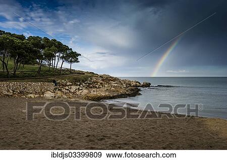"Beach and rainbow, L'Escala, Costa Brava, Catalonia, Spain, Europe" View Large Photo Image Stock Photo - "Beach and rainbow, L'Escala, Costa Brava, Catalonia, Spain, Europe". Fotosearch