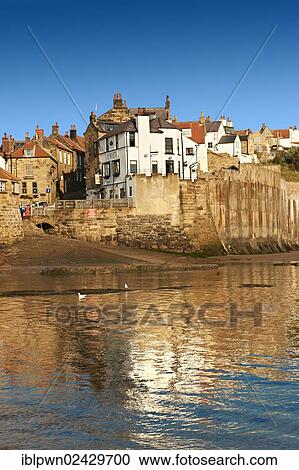"Beach and slipway of historic fishing village of Robin Hood's Bay, Near Whitby, North Yorkshire, England, United Kingdom, Europe" View Large Photo Image Stock Image - "Beach and slipway of historic fishing village of Robin Hood's Bay, Near Whitby, North Yorkshire, England, United Kingdom, Europe". Fotosearch