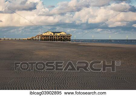 Stock Photography - "Beach bar, 54 Nord, stilt house in the morning light, Sankt Peter-Ording, Eiderstedt, North Frisia, Schleswig-Holstein, Germany, Europe". Fotosearch