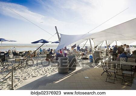 "Beach bar in Wyk, Foehr island, North Frisia, Schleswig-Holstein, Germany, Europe" View Large Photo Image Stock Image - "Beach bar in Wyk, Foehr island, North Frisia, Schleswig-Holstein, Germany, Europe". Fotosearch