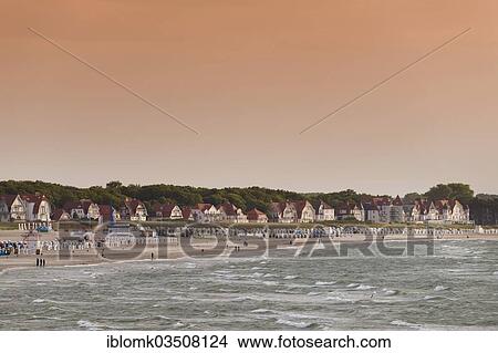 "Beach, beach chairs, mansions, Warnemunde, Rostock, Mecklenburg-Western Pomerania, Germany, Europe" View Large Photo Image Picture - "Beach, beach chairs, mansions, Warnemunde, Rostock, Mecklenburg-Western Pomerania, Germany, Europe". Fotosearch