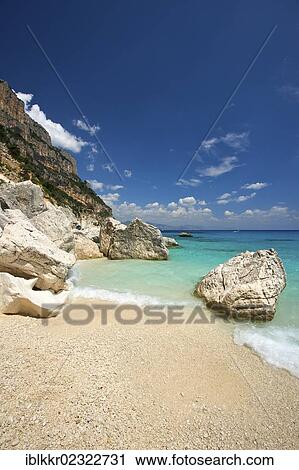 Stock Image - "Beach, Cala Goloritze, Golfo di Orosei, Parco Nazionale del Gennargentu e Golfo di Goloritze, Sardinia, Italy, Europe". Fotosearch