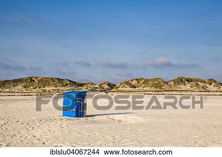 Picture - "Beach chair and dunes, Amrum, North Frisian Islands, North Frisia, Schleswig-Holstein, Germany, Europe". Fotosearch