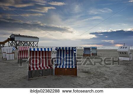 "Beach chairs and house on stilts on the beach of St. Peter-Ording, North Frisia, Schleswig-Holstein, Germany, Europe" View Large Photo Image Stock Photo - "Beach chairs and house on stilts on the beach of St. Peter-Ording, North Frisia, Schleswig-Holstein, Germany, Europe". Fotosearch